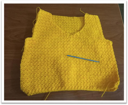 free crochet vest pattern – two rounds of the previous arm hole